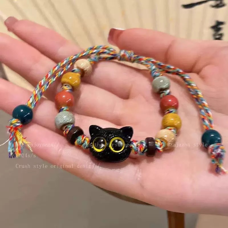 Esqueleto gato brazalete de cuerda trenzada nicho femenino diseño dulce y fresco chino ventanilla brazalete de color joyería