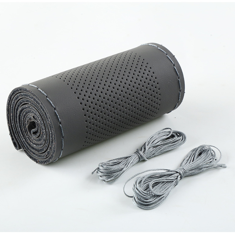 La mano de microfibra artificial que cose la cubierta del volante del coche cuatro estaciones cubierta universal de la manija del coche suministros transfronterizos del interior del coche