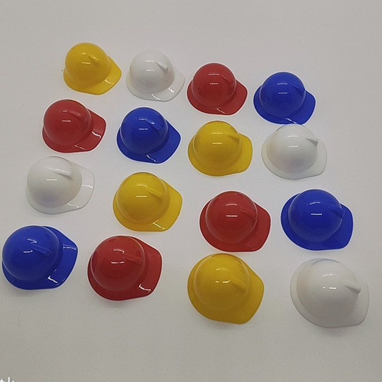 Cross-border mini regalo casco fijo LOGO accesorios de juguete para niños casco 10 Pack sobre 23,8G