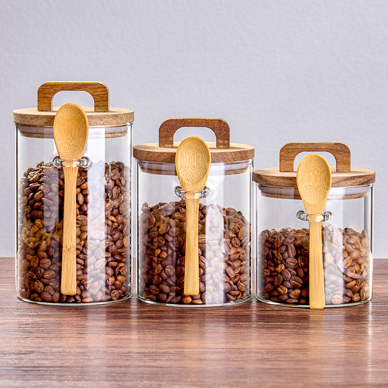 Granos de café con cucharas, frasco de vidrio sellado, tanque de almacenamiento de café en polvo, lata de té, caja de almacenamiento de granos