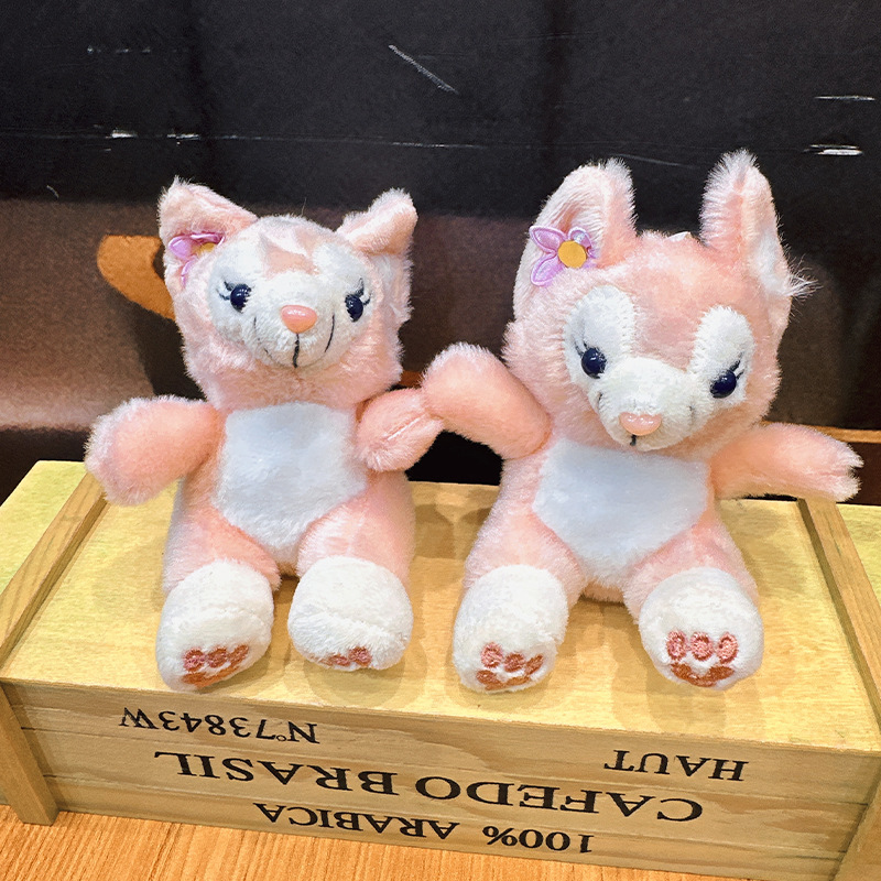 かわいいぬいぐるみのピンクのキツネのキーホルダー卸売りはアニメの人形のキーホルダーのカップルのバッグのペンダントを飾ります。|undefined