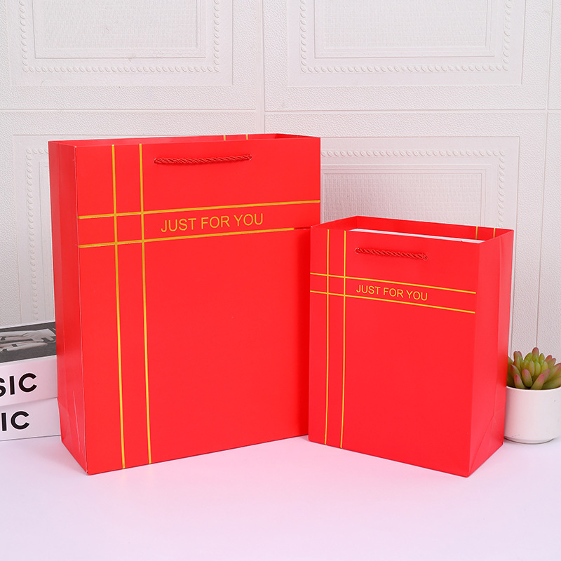 红色牛皮纸白卡纸袋烫金礼品袋外贸跨境热卖手提袋生日送礼包装袋