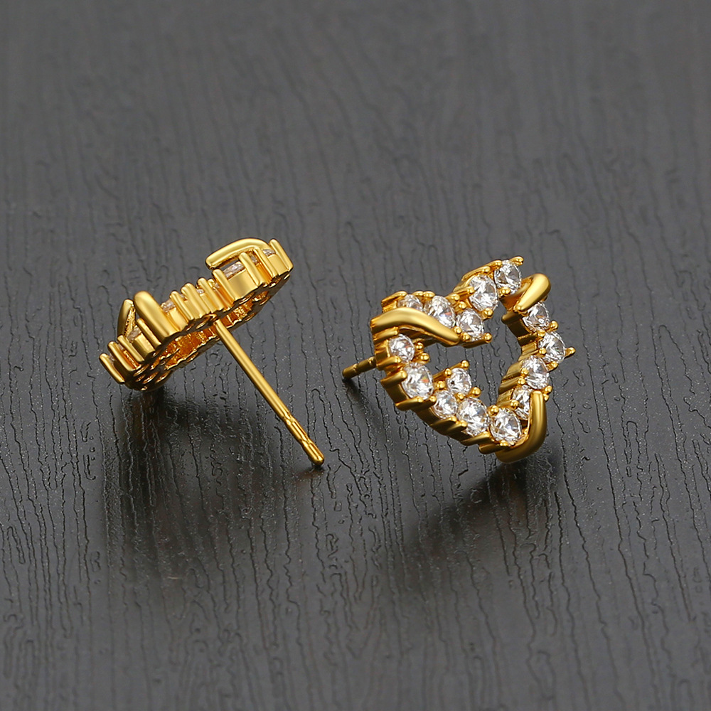 Joyas Xuping aleación de cobre joyas artificiales gemas en forma de corazón pernos de orejas de nicho femenino ligero lujo pendientes de amor en stock