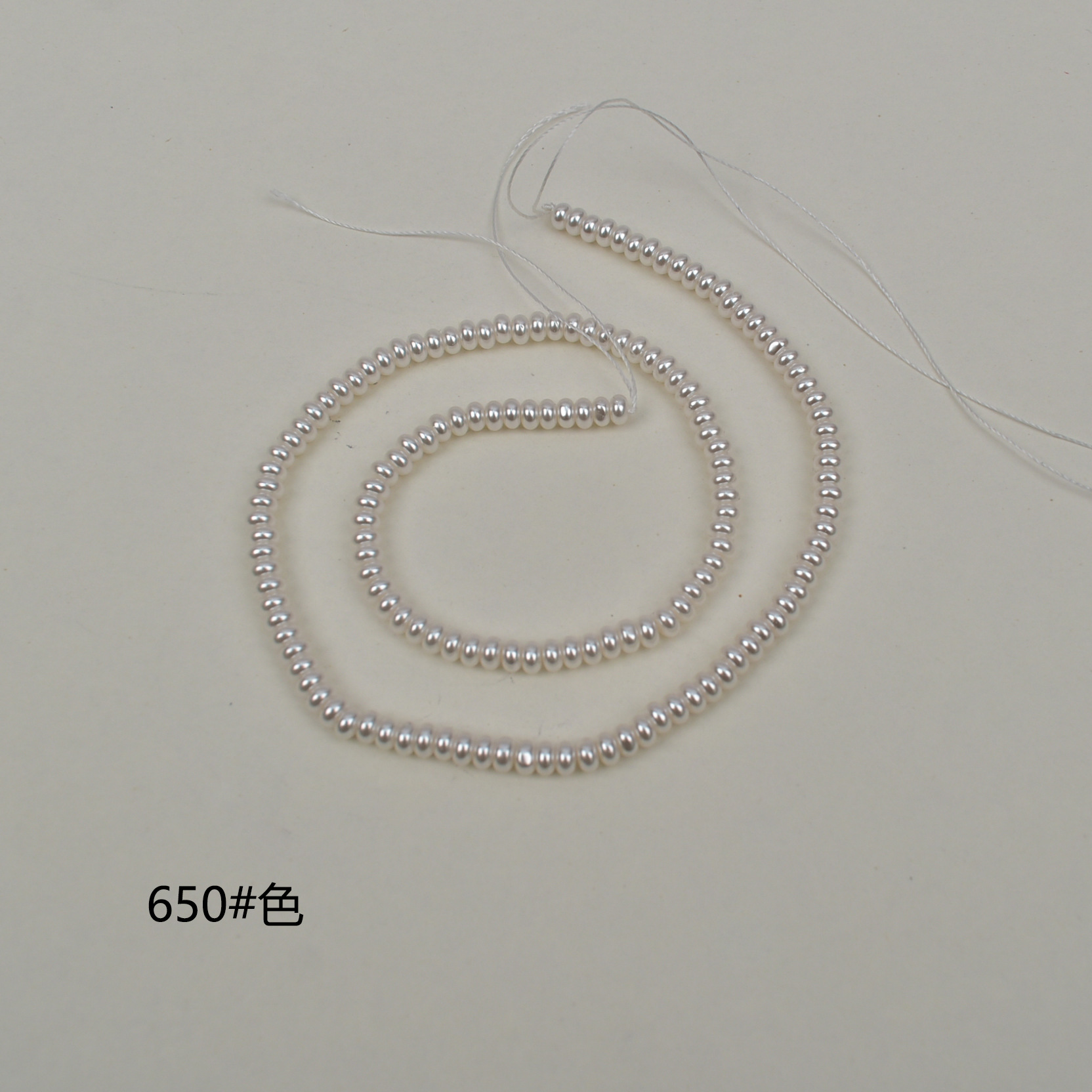 A little pinker, 2*4mm, about 150 pieces in a bunch