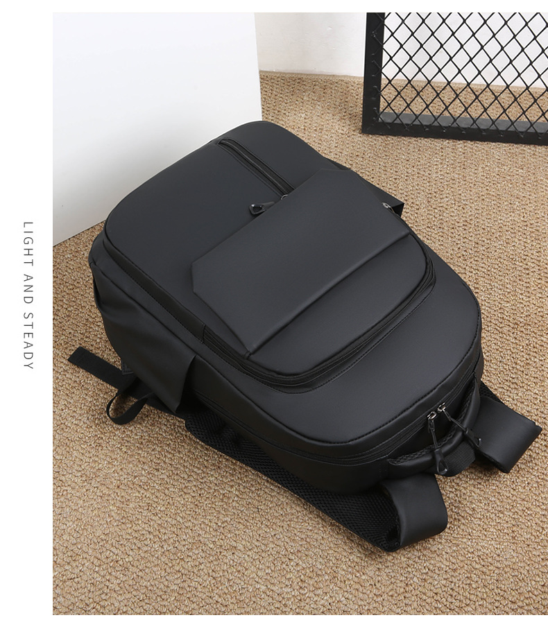 Wholesale of in-stock commuting and business backpacks for men, simple and large-capacity USB charging laptop bags, and student schoolbags undefined