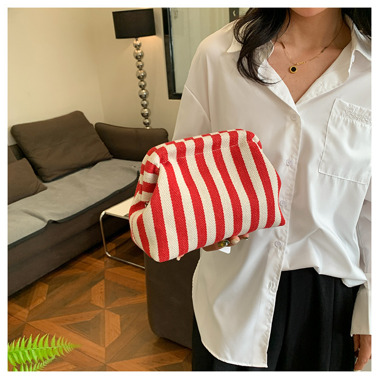 New cross-border fashion color-blocking striped cosmetic bag, women's loose change mobile phone storage bag, trendy and niche cloud clutch undefined