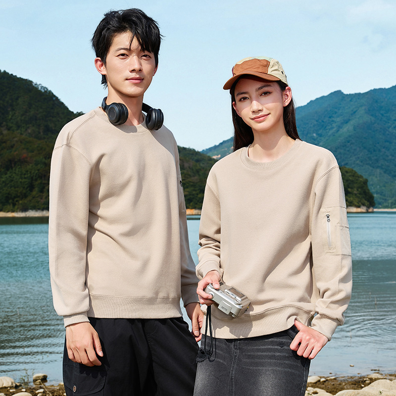 Nueva primavera y otoño chaqueta de cuello redondo estilo deportivo personalizado color sólido camiseta de manga larga herramienta de moda bolsillo de ropa de trabajo