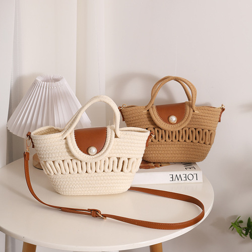 Direct Manufacturer Sale Shoulder Bag with Hollow Weaving, New Style Versatile Hand-held Cotton Thread Women's Bag Beach Vacation Style Sand Bag