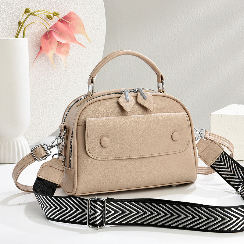Temperamento sensación de bolso cuadrado 2025 nuevo tipo de bolso de hombro casual de moda de viaje bolsos de mano versátiles