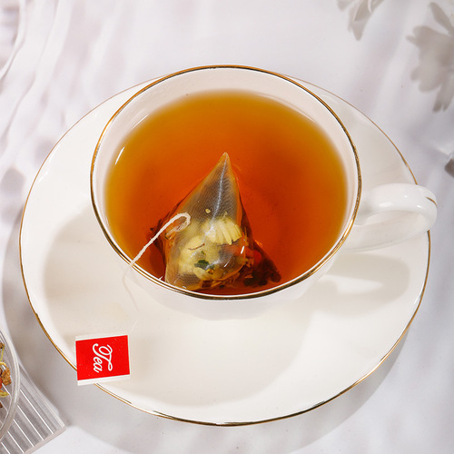 Chrysanthemum, cassia seed tea, triangular bag, cassia seed, burdock root, wolfberry, honeysuckle, edible osmanthus, substitute scented tea