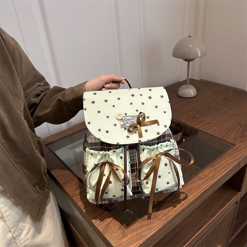 Arco ondulado coreano ins estilo extranjero mochila multifuncional dulce para estudiantes en clase mochila universal