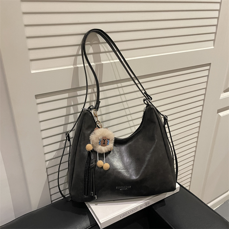 Bolsa de viaje retro de gran capacidad para mujeres 2025 nuevo ocio versátil bolso de hombro de doble uso mochila de hombro