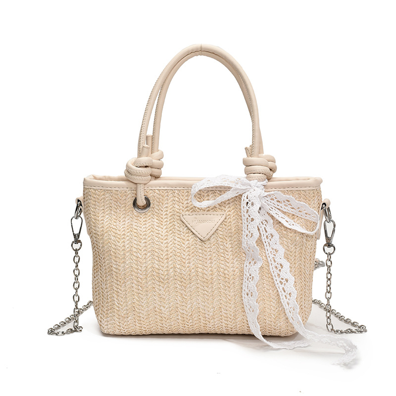 Bolsa de tela retro 2025, bolso de mano de paja de gran capacidad, nueva moda europea y americana, bolso de hombro empalmado