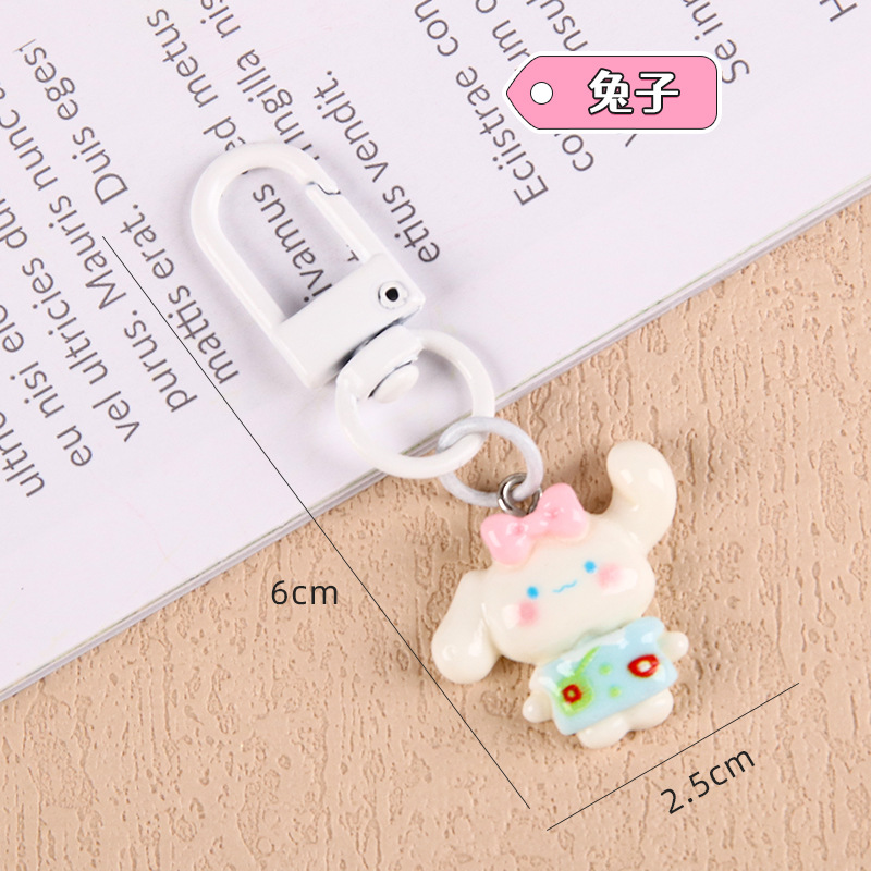 Nuevo estilo de dibujos animados estudiantes llaveros lindos colgantes de resina accesorios bolsos escolares amigos regalos llaveros al por mayor