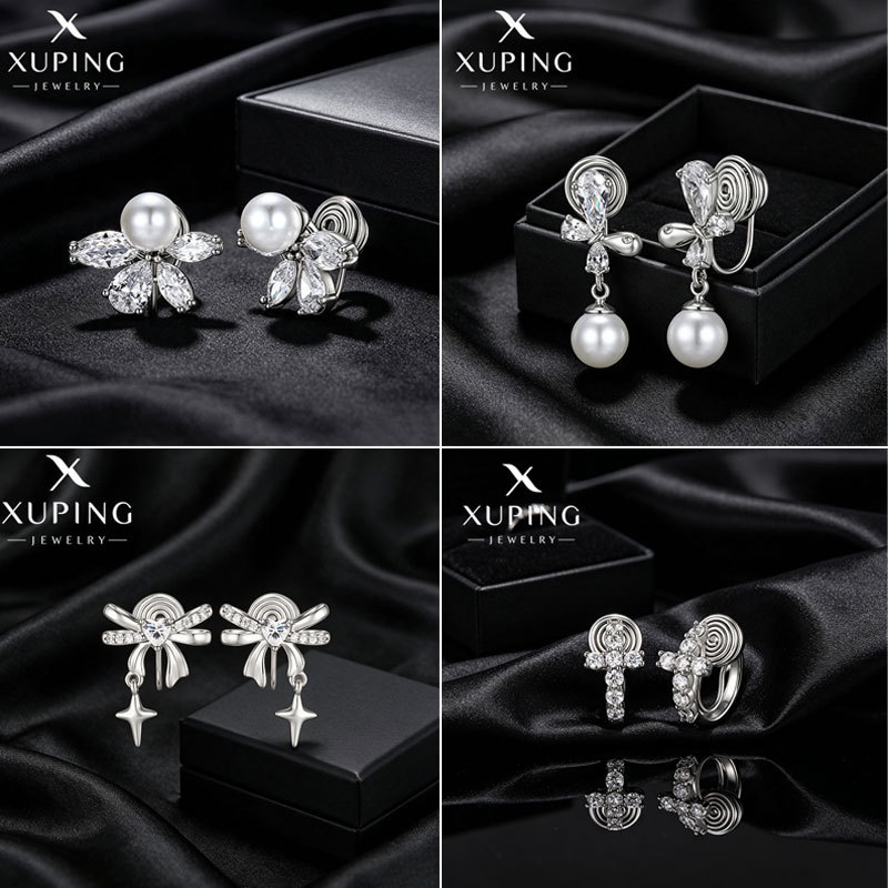 Pendientes de clip Xuping de aleación de cobre con baño de plata, diseño elegante y exclusivo, aretes graciosos y dinámicos para mujeres sin perforaciones en las orejas.