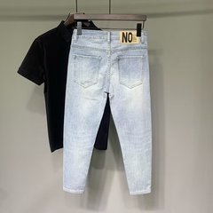 水色のジーパンの男性の春の新型の潮流は簡単です。