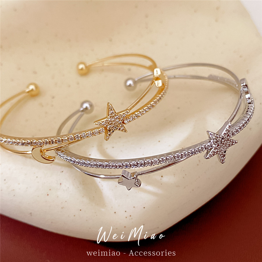 El oro real, la estrella de piedra, la luna, la doble abertura cruzada, la pulsera de personalidad, la pulsera de nicho, el lujo ligero