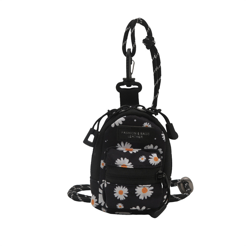 Mini bolso para niños coreano comercio exterior popular leopardo chica mochila de hombro bolso de auriculares de viaje al aire libre bolso de lápiz labial