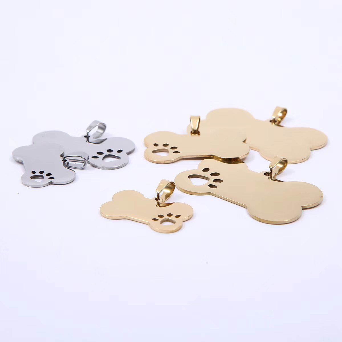 Venta caliente transfronteriza Acero inoxidable Hueso hueco Marca de perro Colgante Metal para mascotas Colgante Regalo Fábrica de letras láser