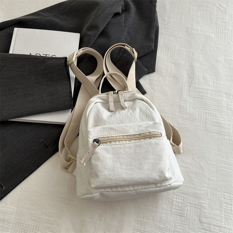 Mochila mini 2026, estilo japonés y coreano, informal, de lona, para estudiantes, de color sólido, versátil, para tabletas
