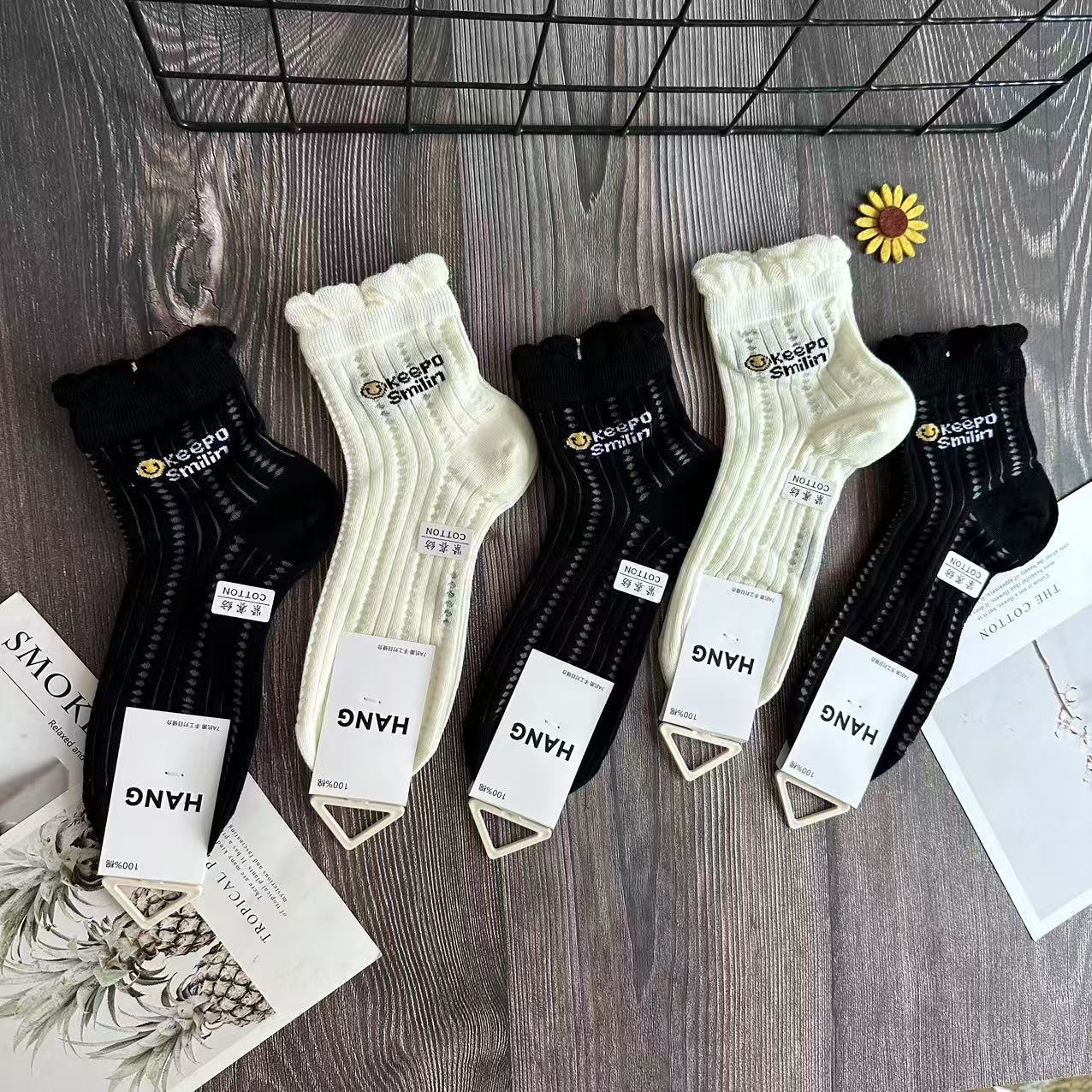 Calcetines deportivos finos de primavera y verano de alta gama para hombres, calcetines de tubo que absorben el sudor y desodorizantes, calcetines de algodón blanco de cintura pequeña y media de verano al por mayor