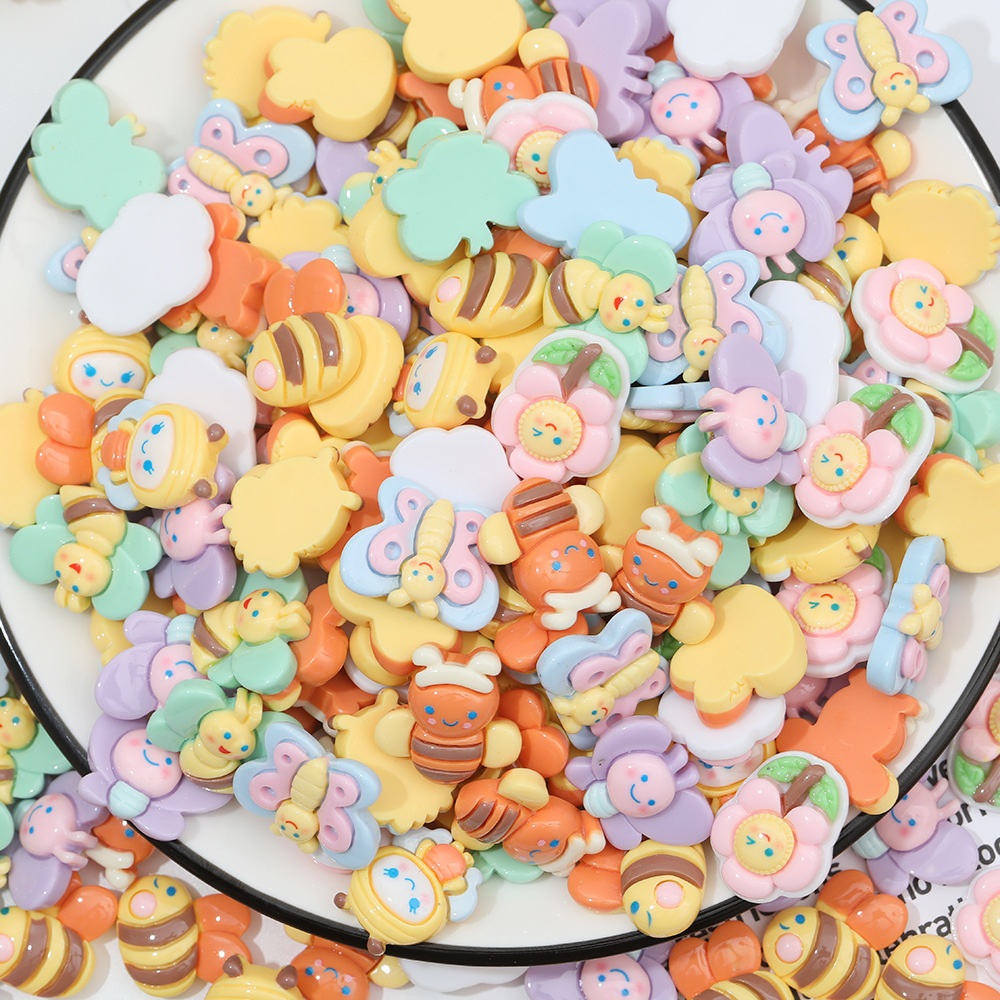 Macaron color pastoral abeja mariposa resina accesorios DIY crema pegamento accesorios para el cabello teléfono móvil Shell accesorios hechos a mano al por mayor