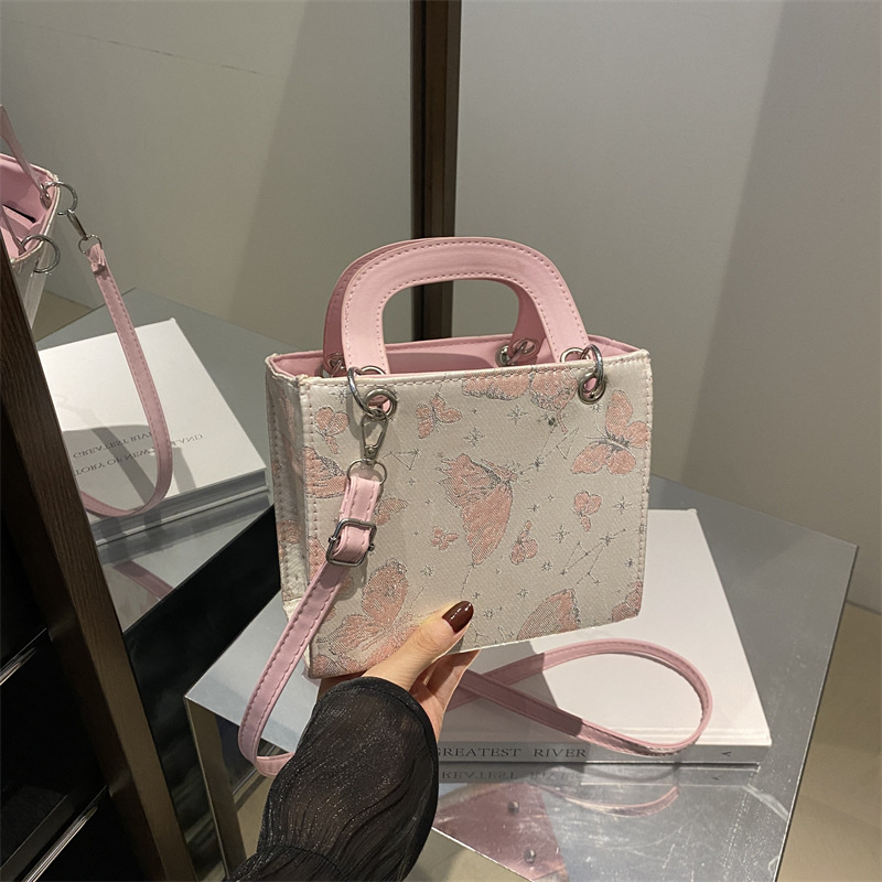 Bolso pequeño de cadena de mensajero de alta calidad de otoño para damas 2024 nuevo bolso cuadrado pequeño con estampado de mariposa de estilo occidental