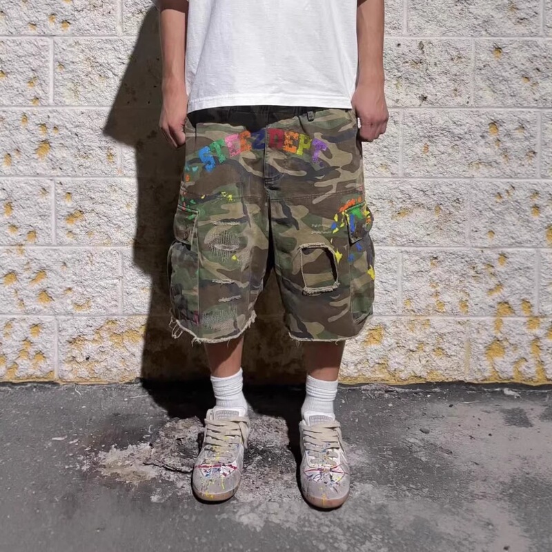 Cross-border American high street camouflage workwear men's cropped shorts with colorful graffiti letters, raw edges, and ripped loose-fit denim Cross-border American high street camouflage workwear men's cropped shorts with colorful graffiti letters, raw edges, and ripped loose-fit denim