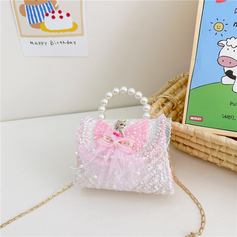 Nuevo bolso infantil, bolso de moda, bolso de princesa, bolso de niña encantador, bolso de mochila para bebés en línea, popularidad