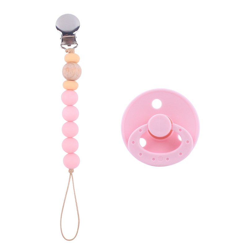 Nuevo bebé suministros chupete DIY creativo bebé silicona mordedura molar pezón cadena traje de dos piezas