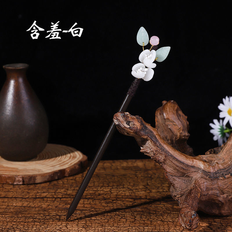 黒檀の木のかんざしのフリンジをまねて、かんざしの子供の古風な頭飾りをします。|undefined