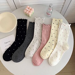 靴下の中筒の耳の辺の夏の波は山を積み上げます。