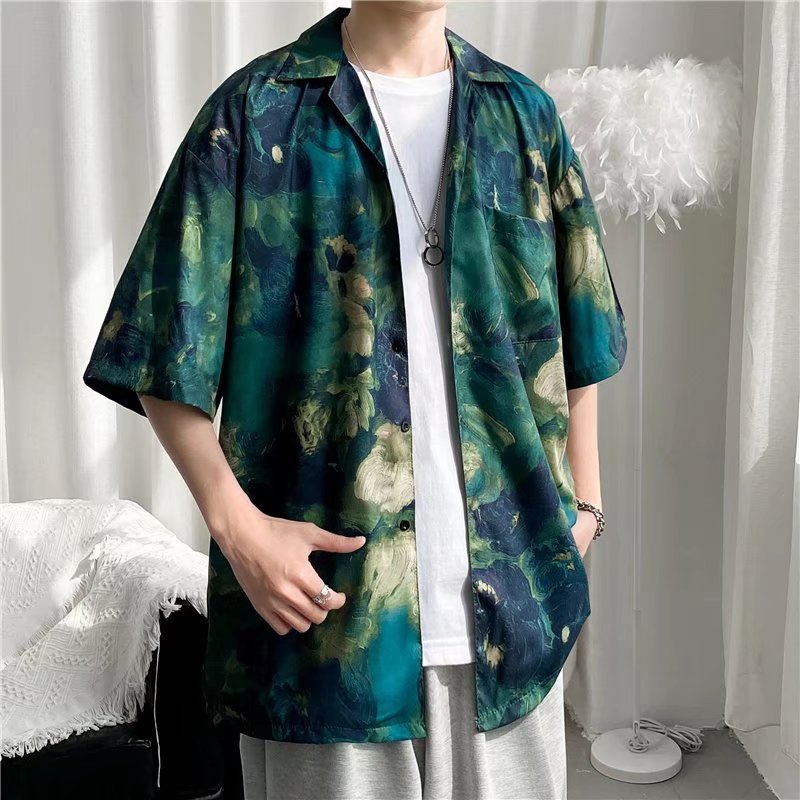Hong Kong estilo Retro Vintage floral camisa de manga corta Estilo Hawaiano tailandés diseño sentido Ruan guapo camisa suelta para hombres y mujeres
