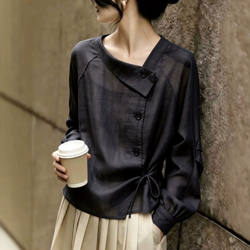 Black diagonal placket tie-up long-sleeve shirt for women, 2026 summer new style, loose fit, slimming, elegant, casual, versatile top Black diagonal placket tie-up long-sleeve shirt for women, 2026 summer new style, loose fit, slimming, elegant, casual, versatile top