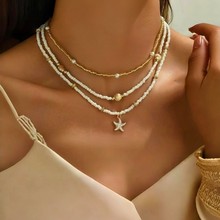 NZ3345欧美跨境软陶珍珠叠戴款项饰不规则贝壳海星型时尚女项链