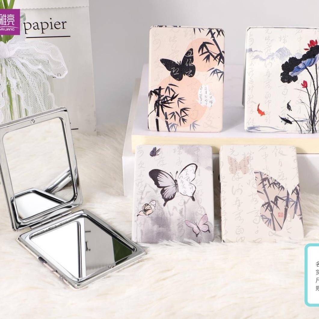 Espejo de maquillaje plegable personalizable en PU, portátil.