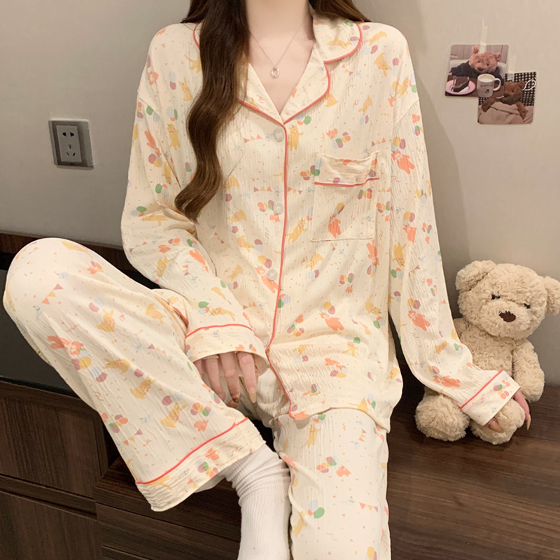 蝶結びのさくらんぼのプリントの女性のパジャマの春と秋の新型のカーディガンの長袖のズボンの部屋の服のスーツは実際に卸売りをたたきます。|undefined