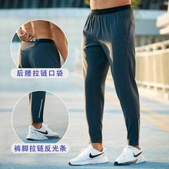 薄い氷の糸のランニングの運動のズボンの男性のファスナーのズボンの足のゆったりとした速乾のフィットネストレーニングのズボンの後ろの腰は携帯電話を置くことができます。