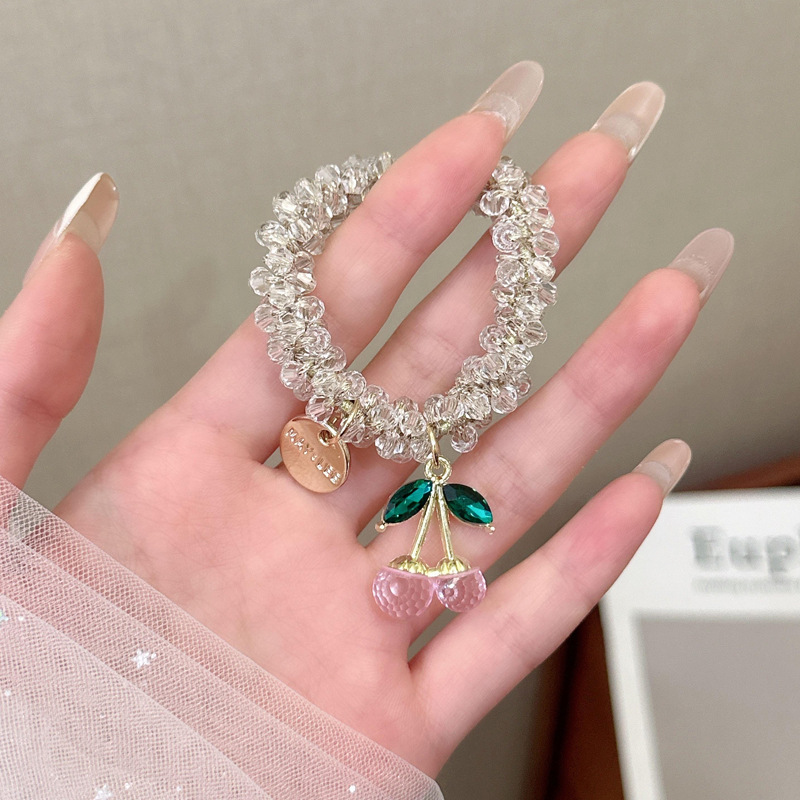 髪の輪のひもの女性韓国の高級感の卸売りの高弾力の新型のさくらんぼのブレスレットの両用の水ドリルの皮の筋|undefined
