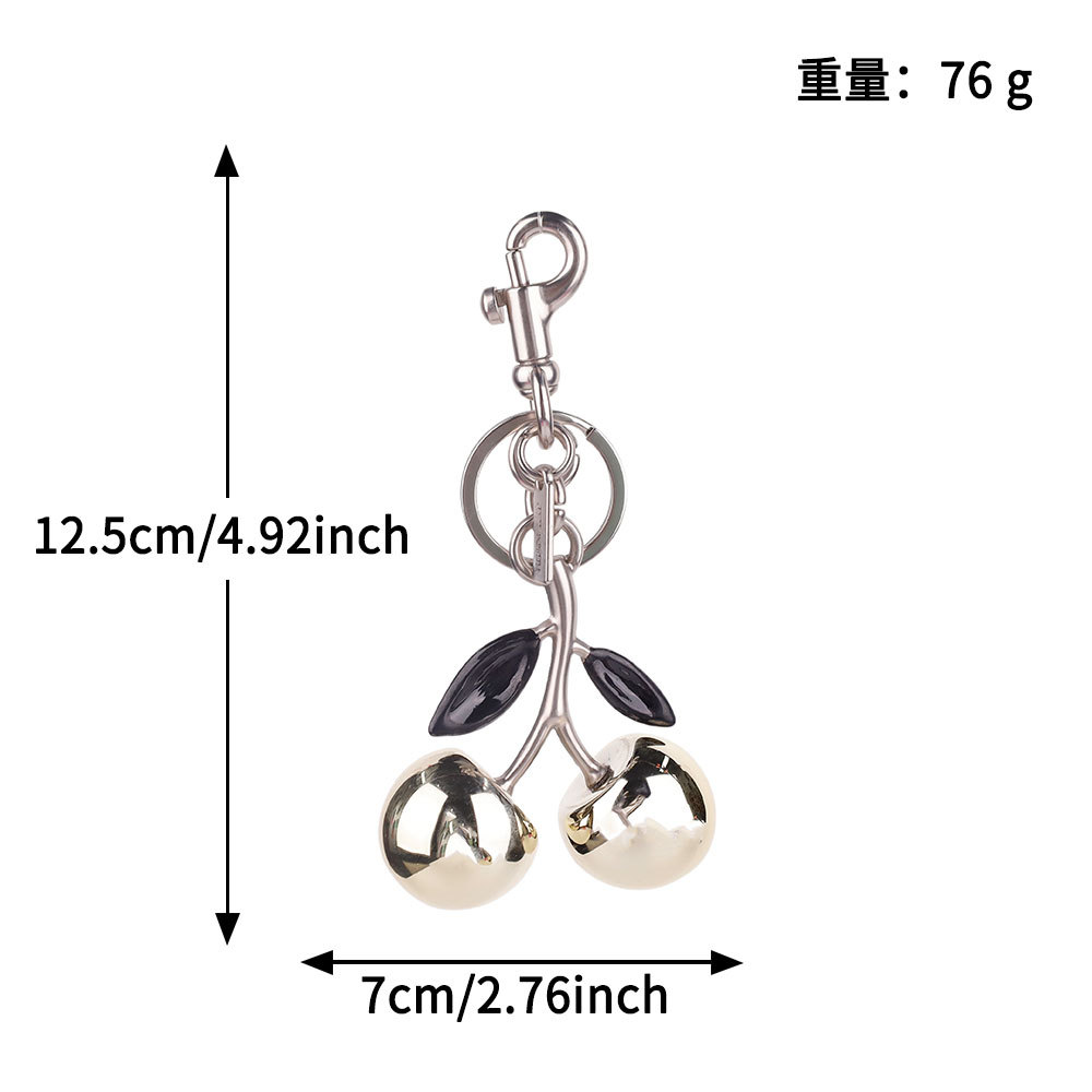 Transfronterizos directamente para bolsas de cereza colgantes de moda llaveras de automóviles llaveras de Amazon llaveras de metal accesorios de bolsas al por mayor