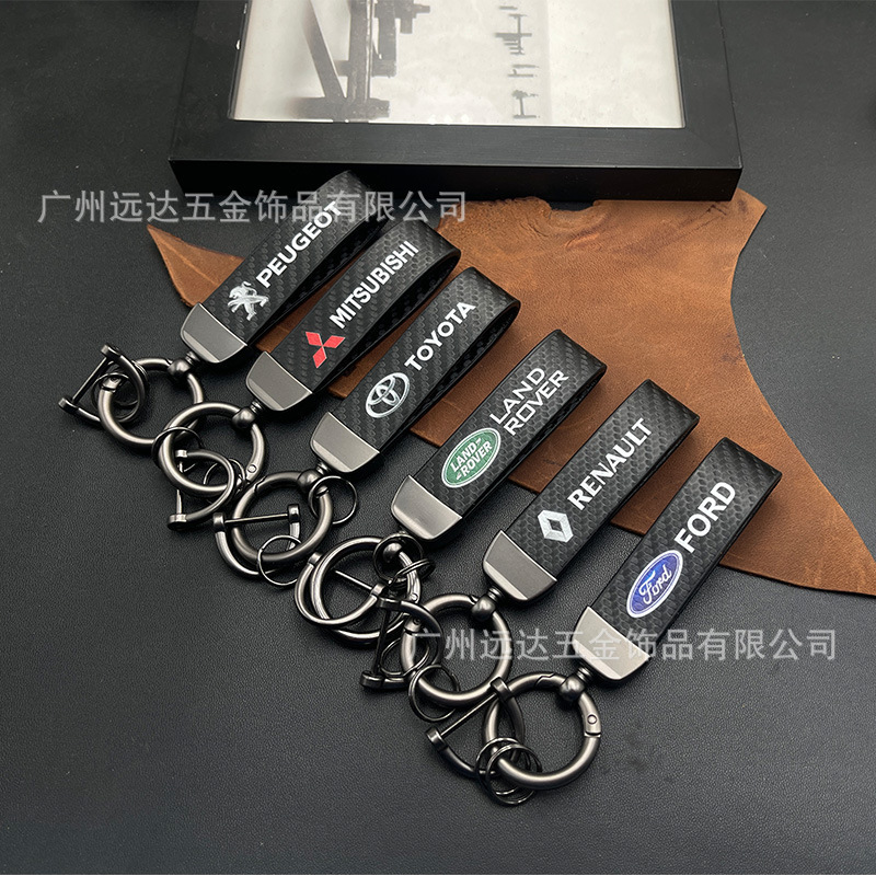 Car keychain brand LOGO keyring carbon fiber pattern metal high-end pendant unisex keychain wholesale Car keychain brand LOGO keyring carbon fiber pattern metal high-end pendant unisex keychain wholesale