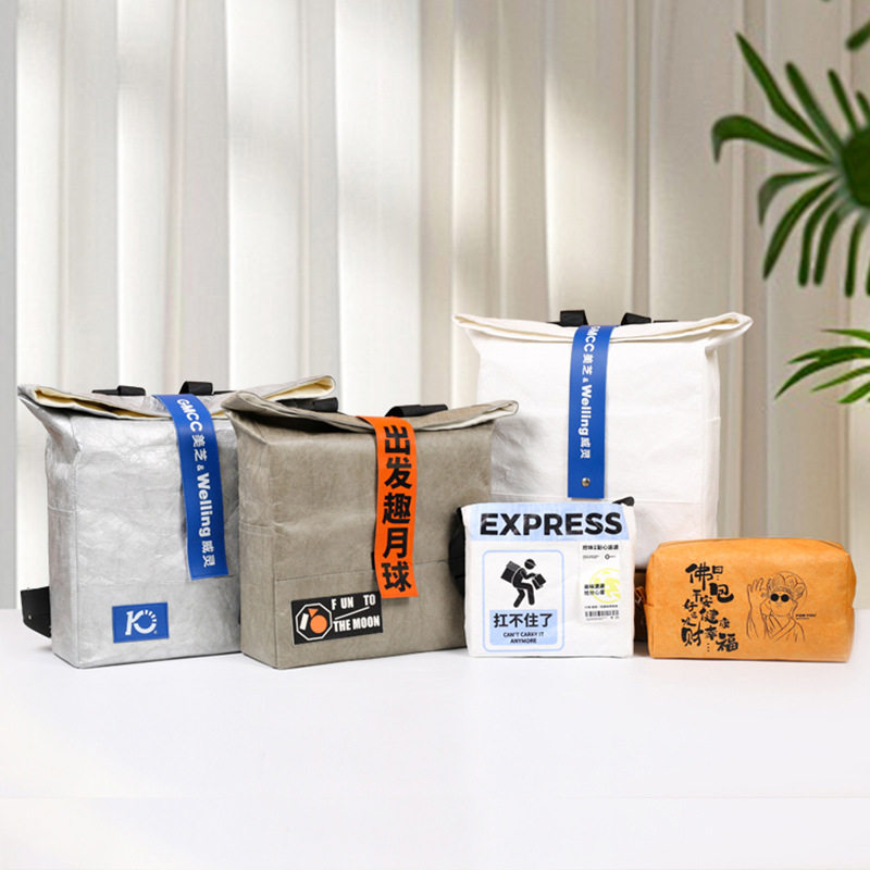 Bolsas de papel DuPont retro personalizadas para salir bolsa de compras kraft impermeable impresión LOGO de hombro único bolsas de papel DuPont