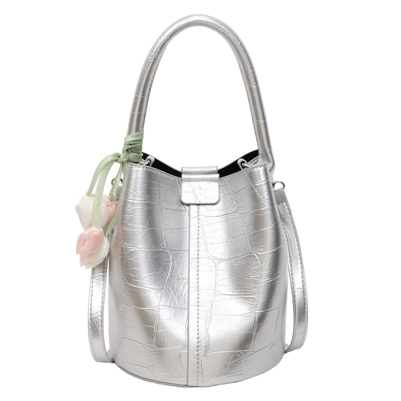 Bolso de cubo de jardín de verano 2025 nuevo bolso de mano estilo extranjero bolso de hombro con patrón de piedra pequeño bolso de mensajero fresco para mujer