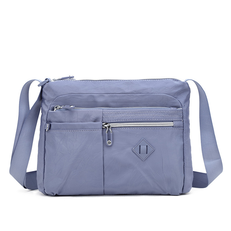 Bolso de mujer 2023 nuevo bolso de hombro impermeable de tela Oxford bolsa de mensajero de tela de nylon bolsa de viaje de mujer de mediana edad