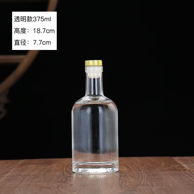 Botella de vidrio de vodka de alta calidad botella de vino de fruta cristal transparente de arena blanca dividida botella vacía con película de retracción térmica en stock