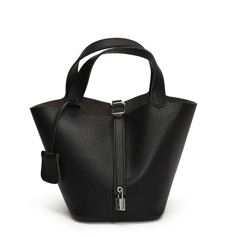 Bolsos de cesta de verduras de estilo caliente de comercio exterior para mujer 2025 nuevo bolso de cubo de ocio simple bolso femenino de alta gama de nicho