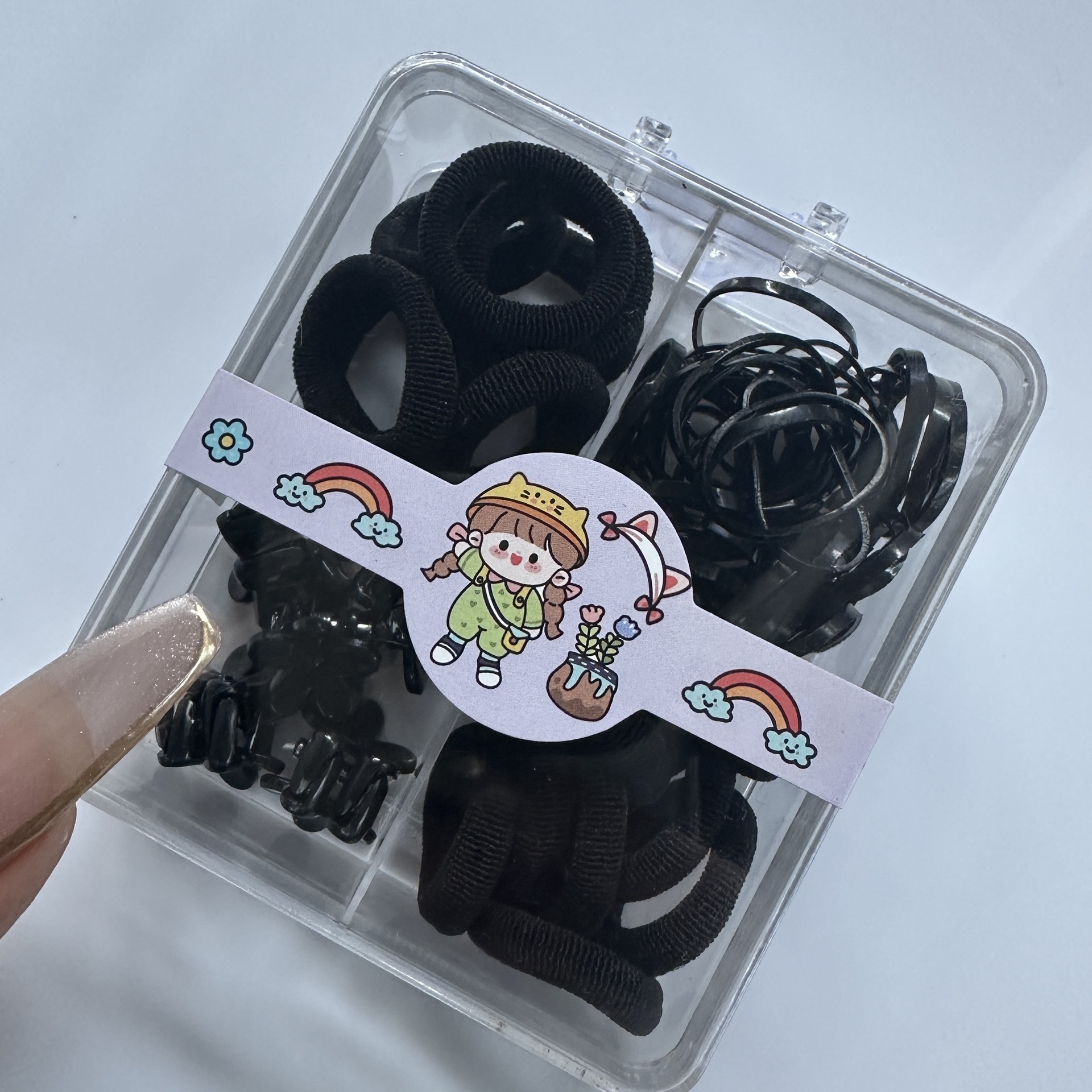 Al por mayor 2.5 pulgadas pulgar pequeño anillo de cabello nuevo niño no lesiones de cabello correa de color caja de chaqueta de cabello pequeña personalidad encantadora