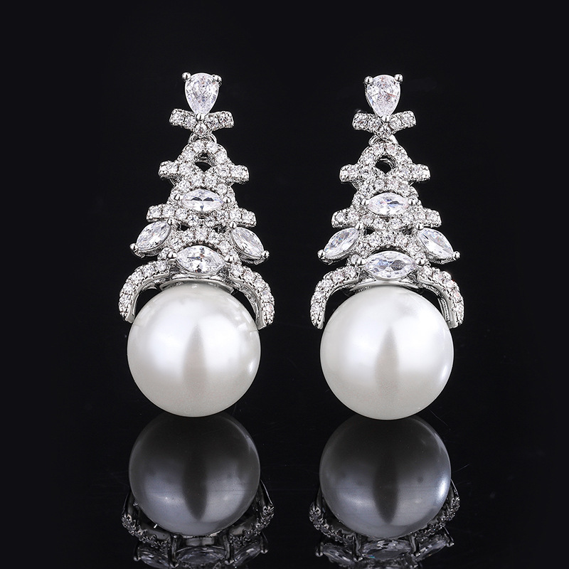 Zhuang Sheng joyería nuevo fondo de cobre chapado en oro con incrustaciones de perlas pendientes de moda coreana 12mm al por mayor