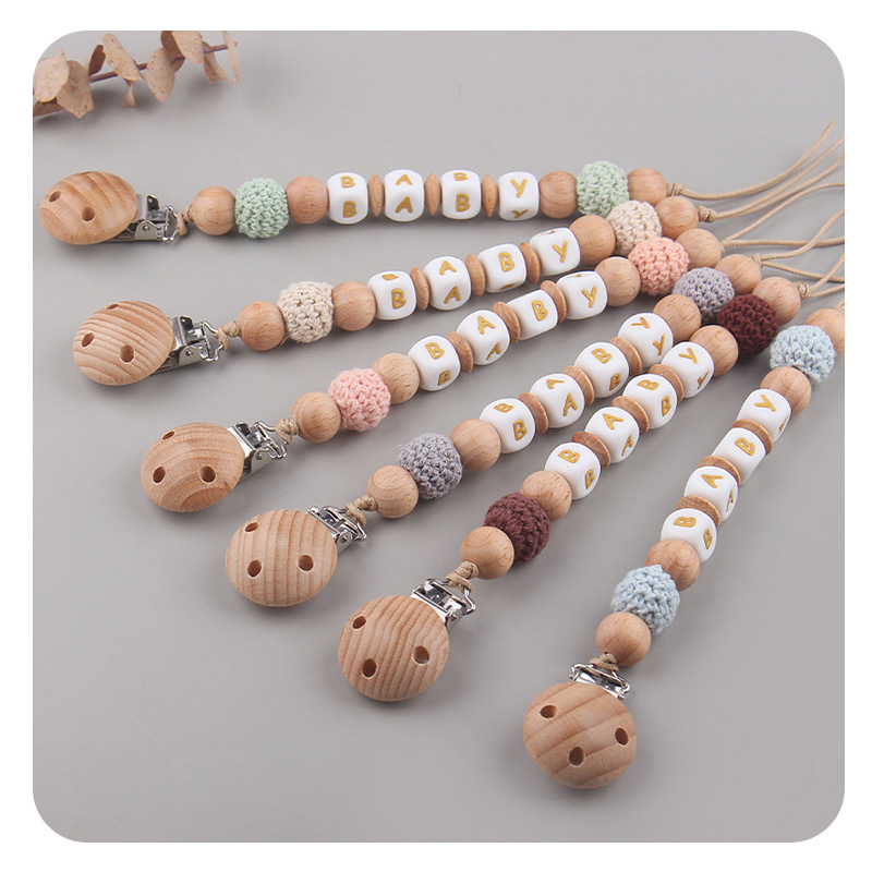 Productos para niños pequeños abrazadera de tetina de beech nombre de bebé DIY creativo de silicona bola de lana calmante tetina cadena anti-caída cadena