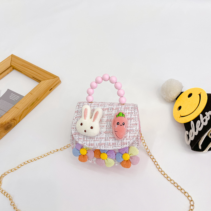 2022 nuevos niños bolso de hombro crossbody Chanel estilo niñas bolsa perla portátil accesorios de dibujos animados bolsa de desgaste